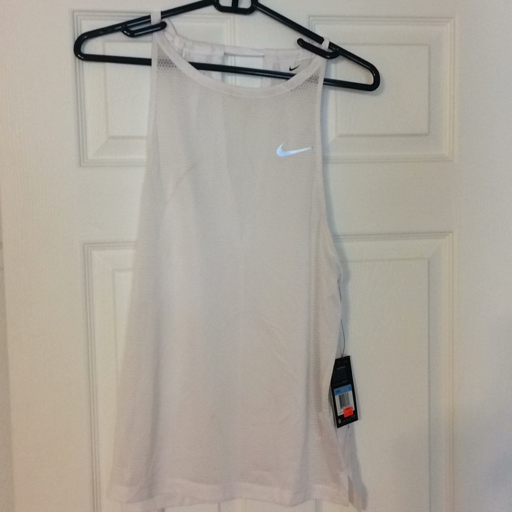Women’s Nike athletic top NWT. Size M. White mesh.